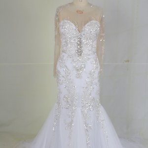 Darius Cordell - sheer long sleeve wedding gown with bling